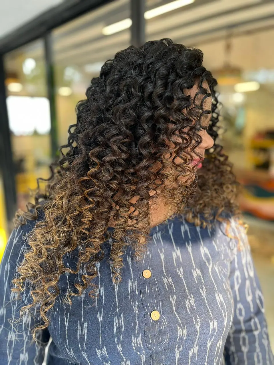 Dimensional spiral curls ombre hair result at Bizarre Salon Lullanagar