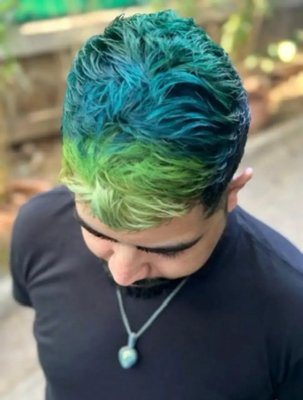 Men's neon green and teal vivid hair colour at Bizarre Salon Lullanagar Pune